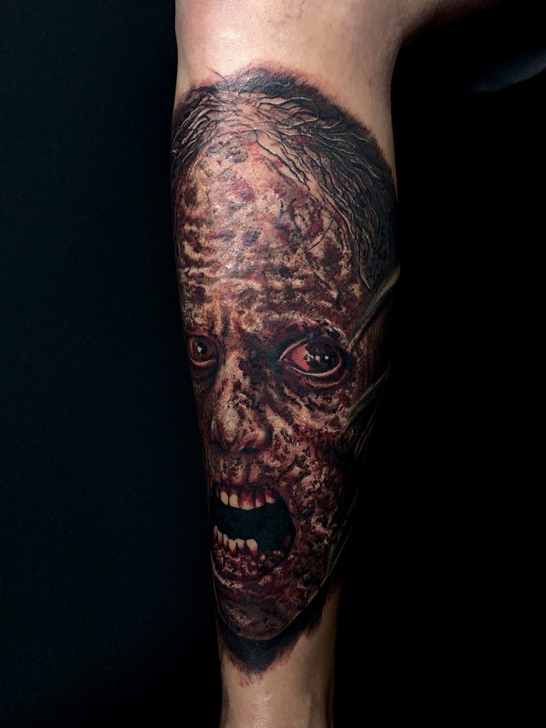 Coloured zombie leg tattoo