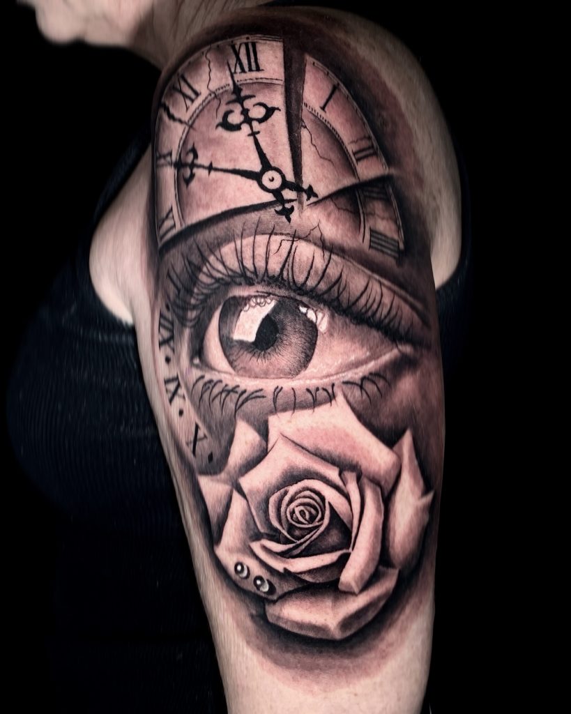 Black and white clock eye and rose tattoo