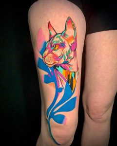 Blue and pink sphynx cat neotraditional leg tattoo